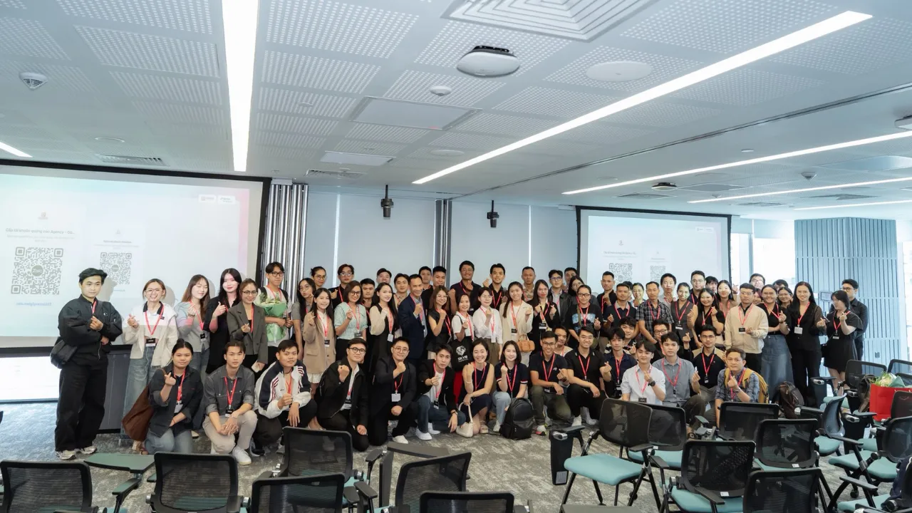 Guests and students in a group photo after a TikTok knowledge-sharing event